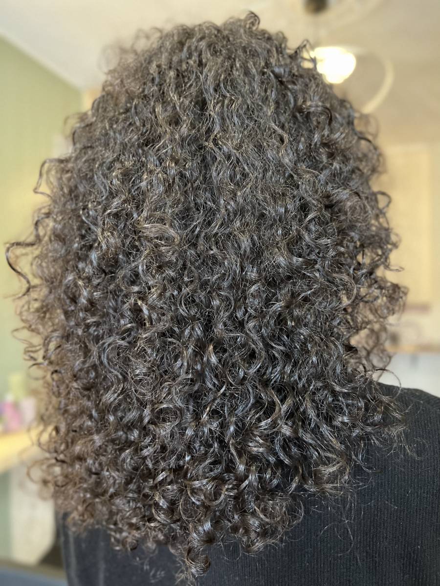 Cheveux frisés coupe sur cheveux secs Villenave